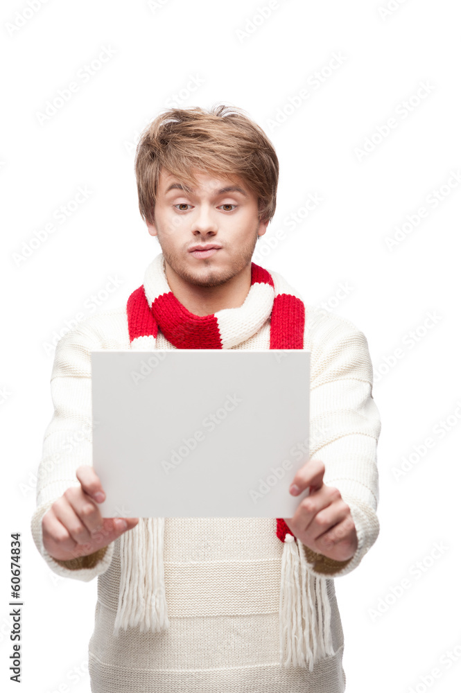young funny man holding sign young funny man holding sign