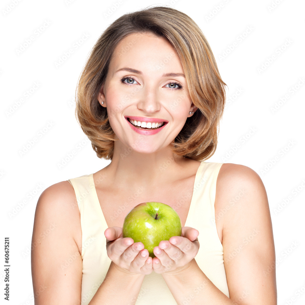 Young happy smiling woman with green apple. Young happy smiling woman with green apple.