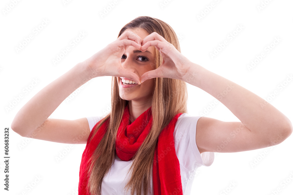 Smiling beautiful girl shows heart with hands Smiling beautiful girl shows heart with hands