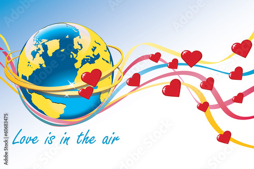 Planet Earth with wedding rings, hearts and colorful tapes