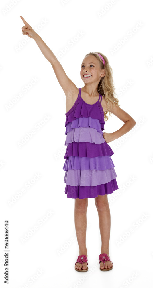 Little Girl Pointing Upward on White Background Little Girl Pointing Upward on White Background