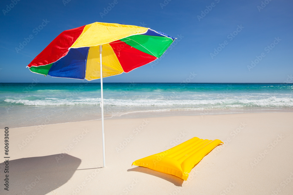 colorful sunshade and air mattress