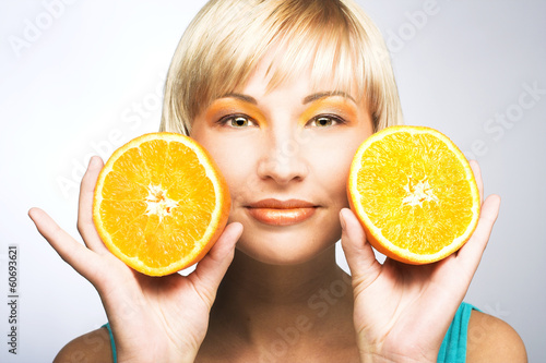 Woman with oranges