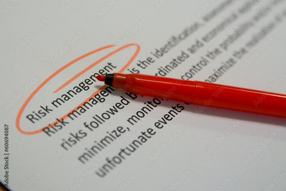 risk management circled text with red pen risk management circled text with red pen