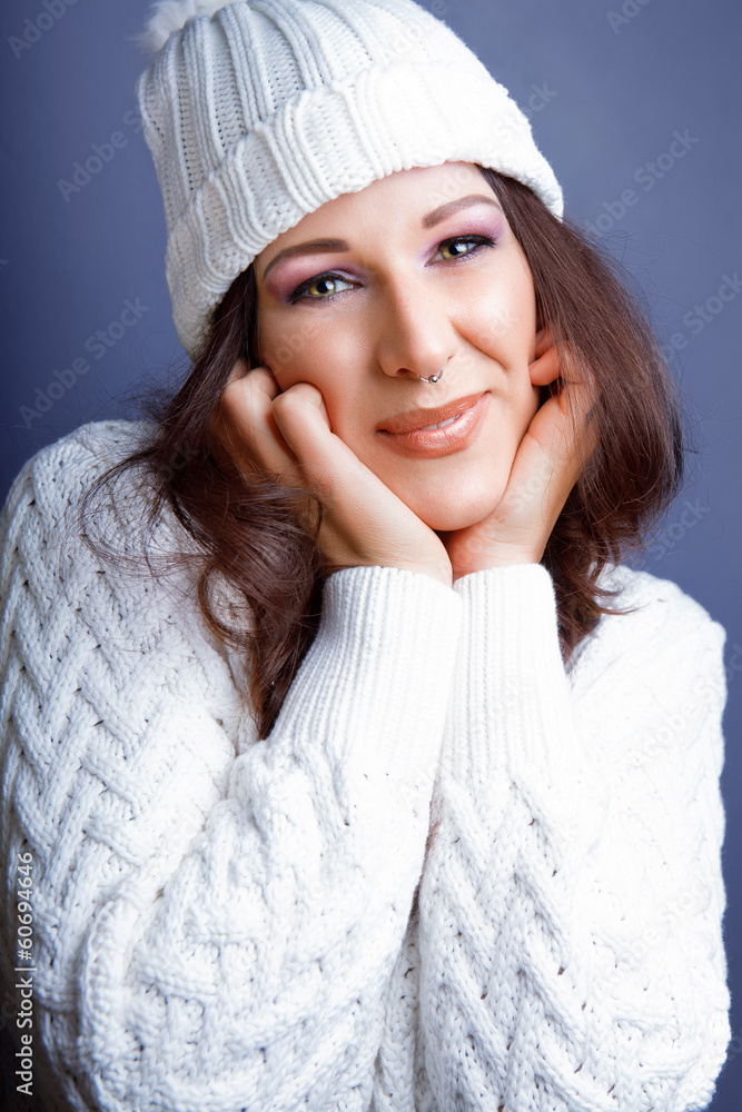 Obraz premium attractive young caucasian woman in warm clothing.,