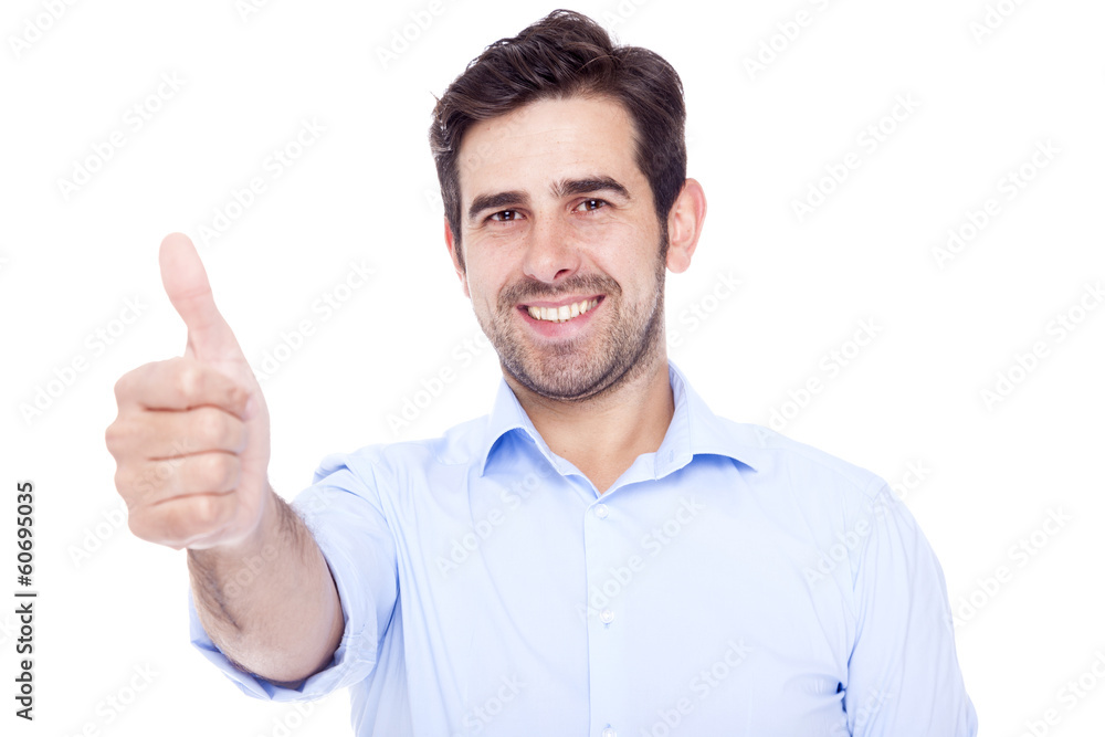 Handsome latin man thumbs up over a white background Handsome latin man thumbs up over a white background