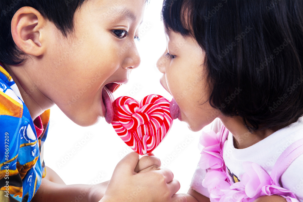 Two children with lollipop Two children with lollipop