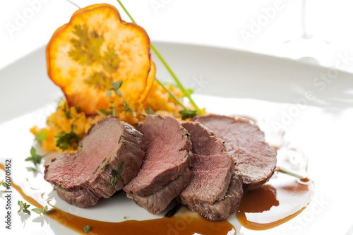 Roasted deer with smashed sweet potatoes and chips