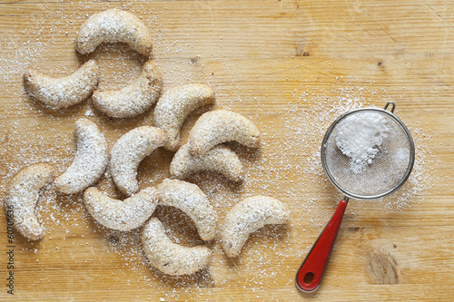 Fresh Vanilla Cookies With Powdered Sugar For Christmas on woode