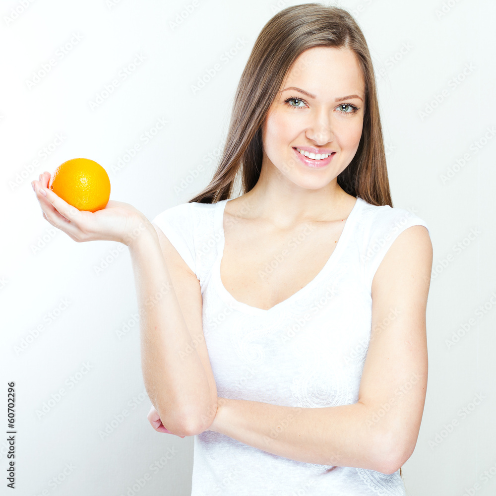 Portrait of a young beautiful woman with orange Portrait of a young beautiful woman with orange