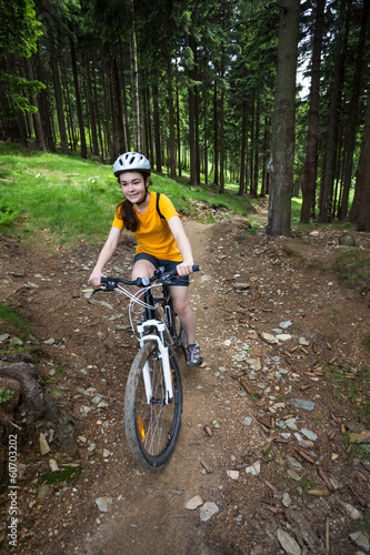 Healthy lifestyle - teenage girl cycling