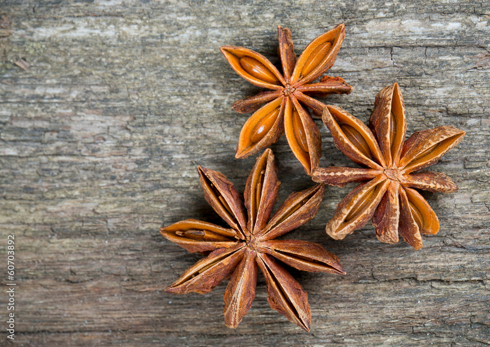 star anise on wooden surface