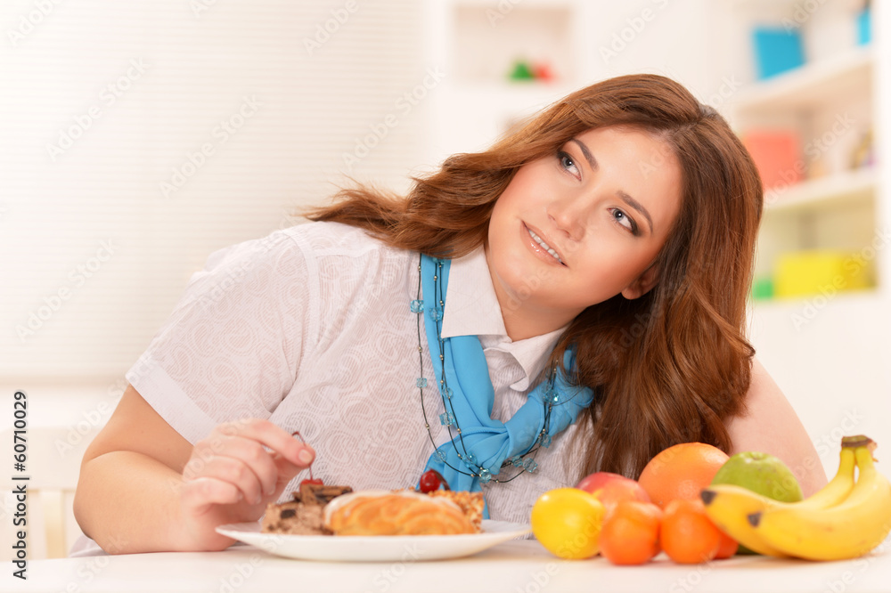 Young woman choosing a diet