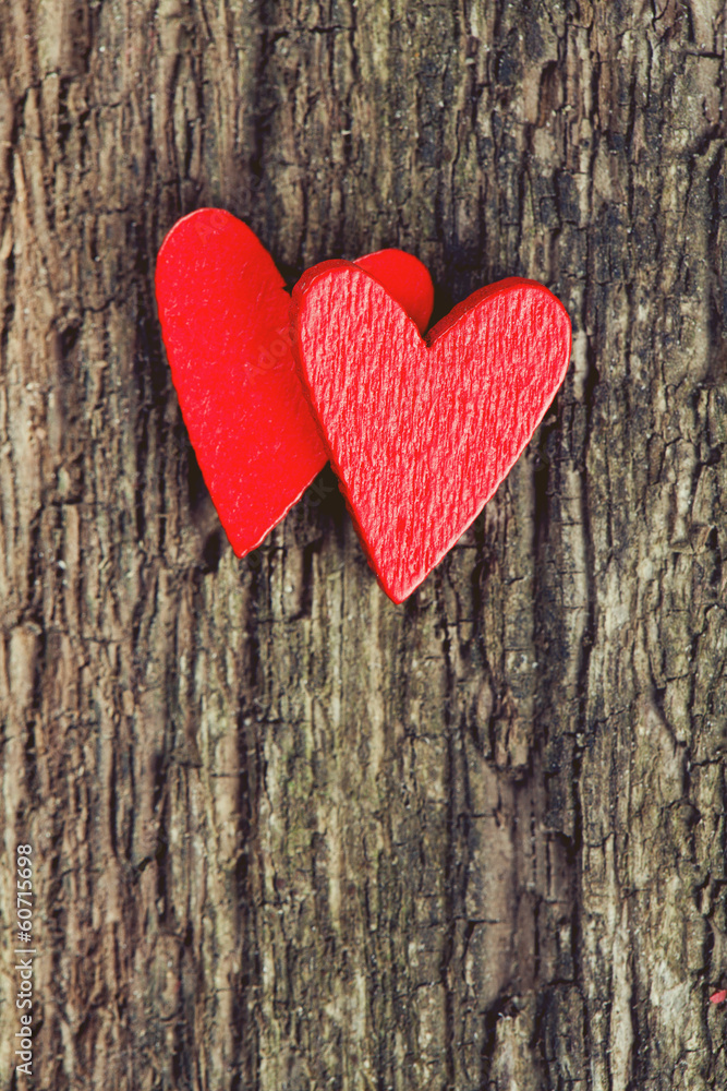 red hearts on rustic wooden surface red hearts on rustic wooden surface