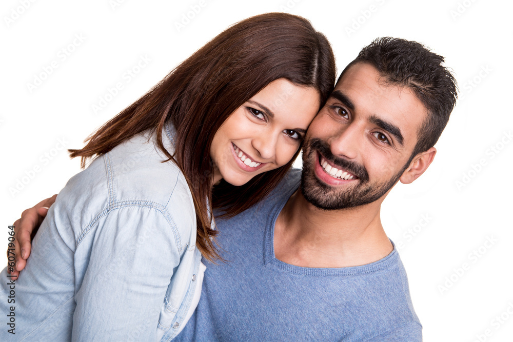 Couple posing over white background Couple posing over white background