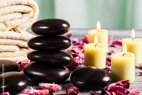 Spa still life with hot stones and candles