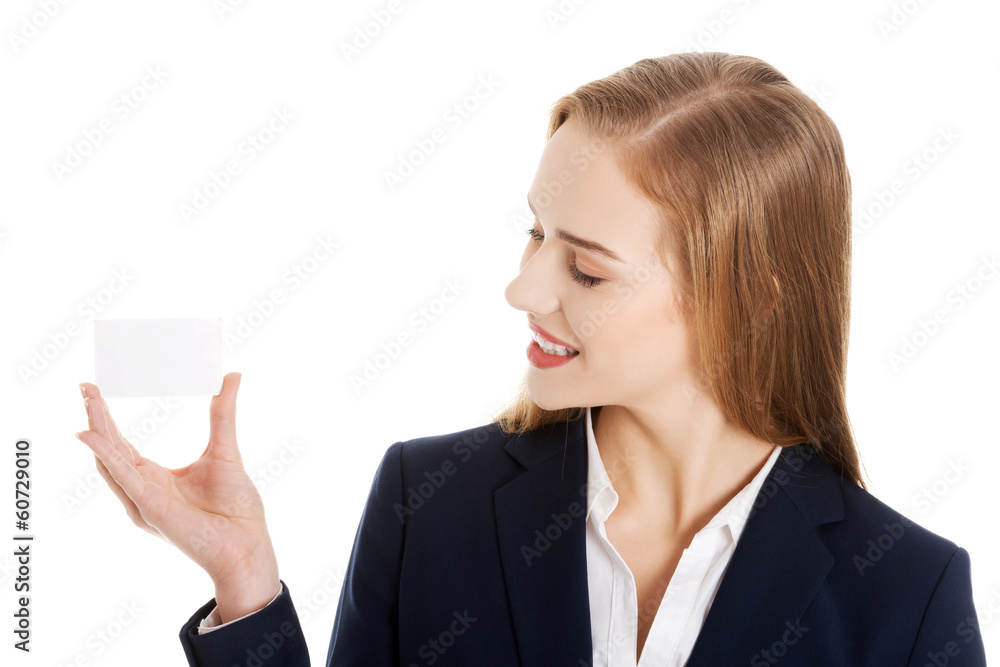Beautiful caucasian business woman holding personal card. Beautiful caucasian business woman holding personal card.