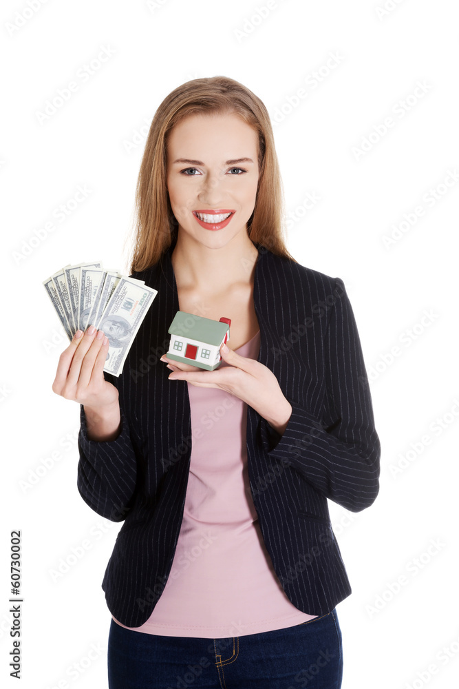 Beautiful caucasian business woman holding dollar curency and mo Beautiful caucasian business woman holding dollar curency and mo