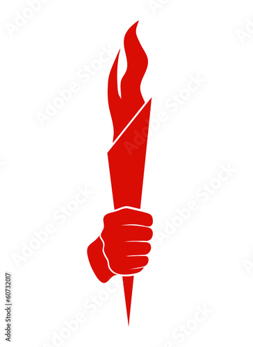 silhouette of a hand with a torch