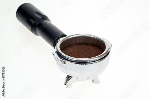 Espresso coffee portafilter with ground coffee power within