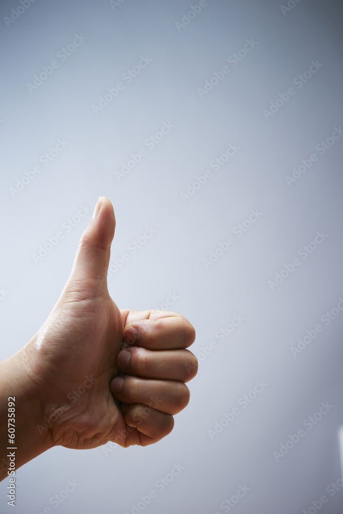 Hand with thumbs up