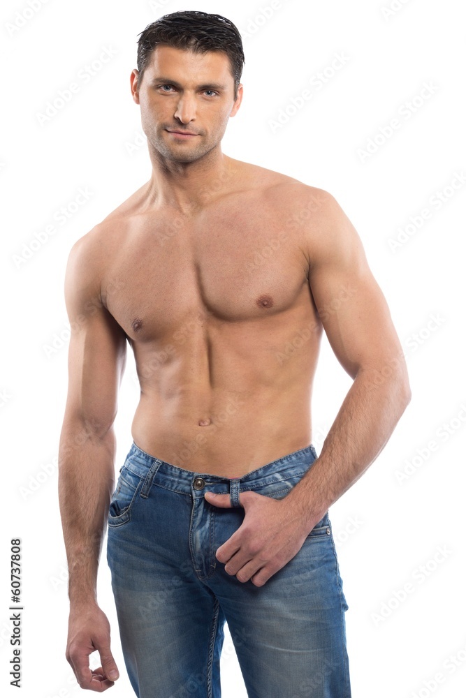 Handsome young man in blue jeans with naked torso Handsome young man in blue jeans with naked torso