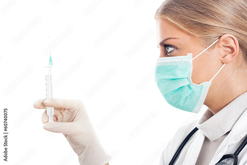 Doctor with protective mask and syringe Doctor with protective mask and syringe