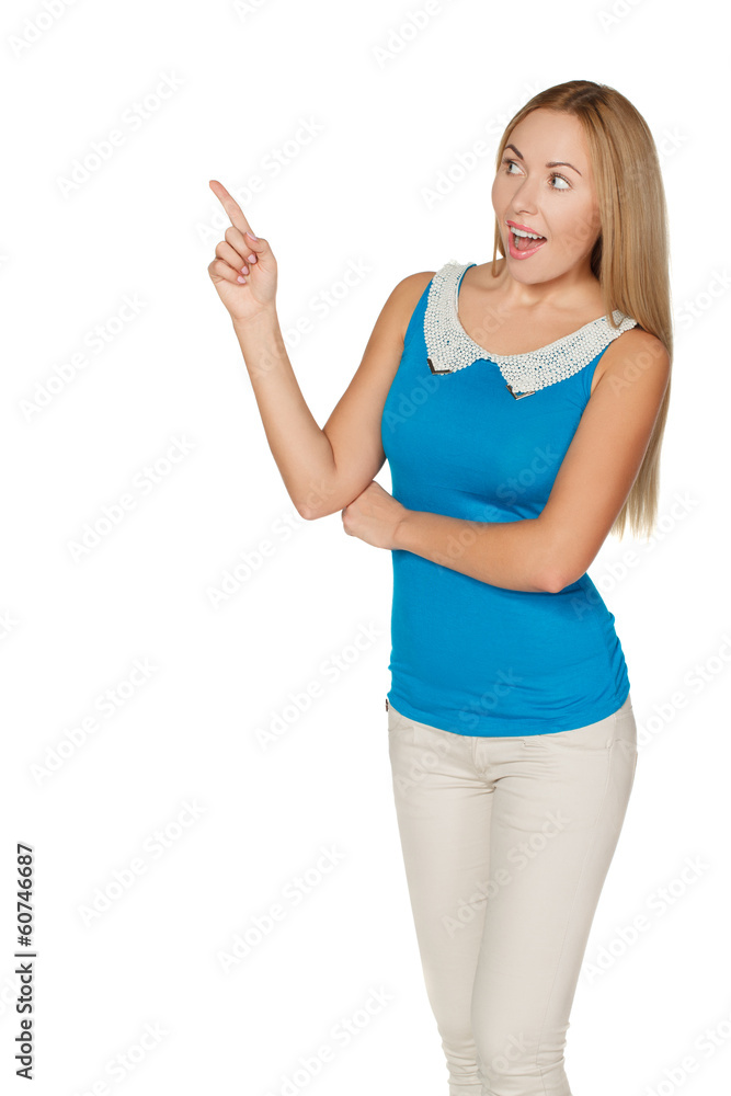 Closeup portrait of beautiful young woman pointing her finger Closeup portrait of beautiful young woman pointing her finger