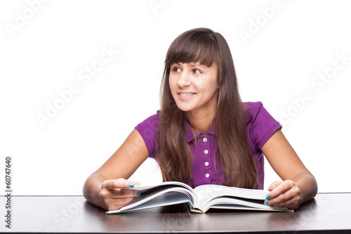 girl sitting with open book