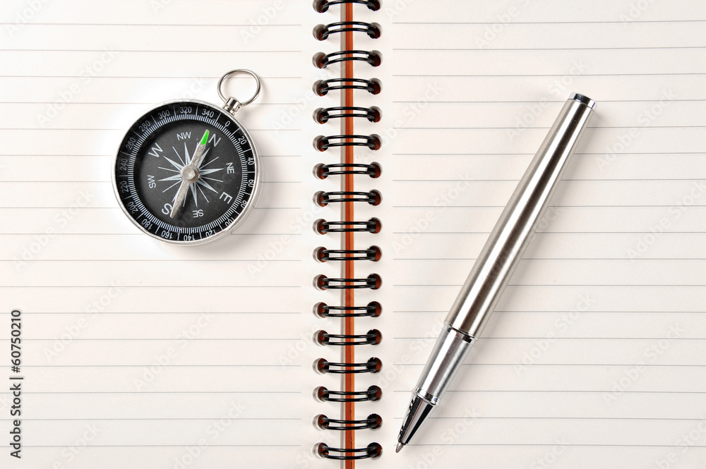 the pen,compass and notebook the pen,compass and notebook