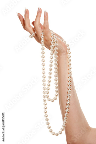 Woman hand with pearls