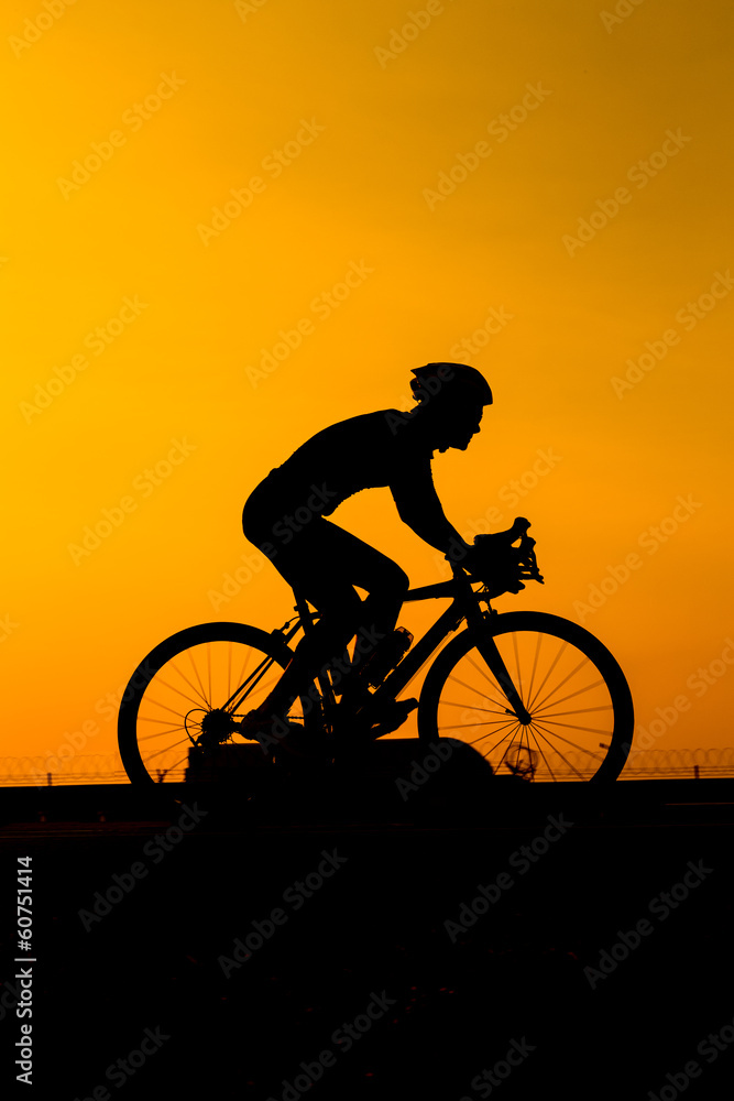 man biking on the road