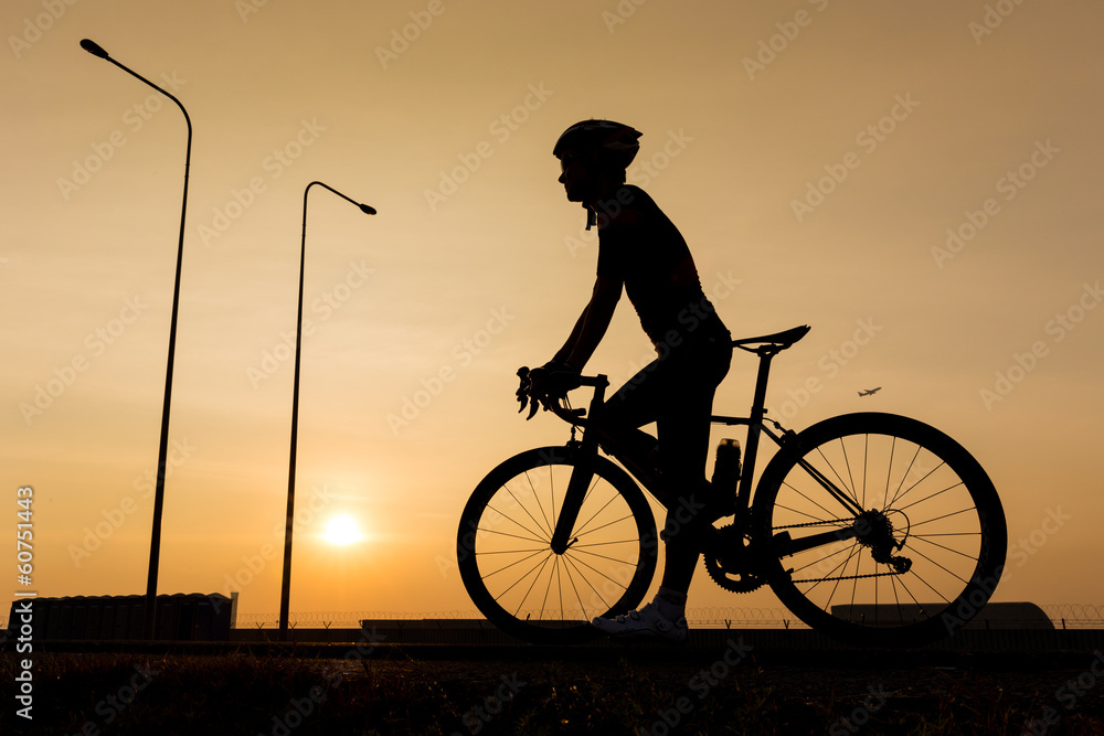 Fototapeta premium man biking on the road
