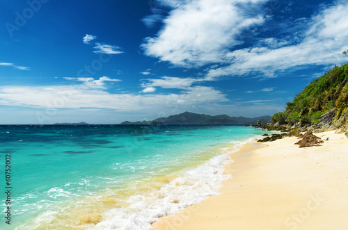 White sand beach. Malcapuya island, Philippines