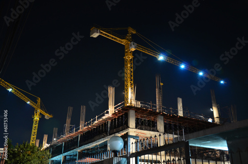 Building construction Site night time at Thailand