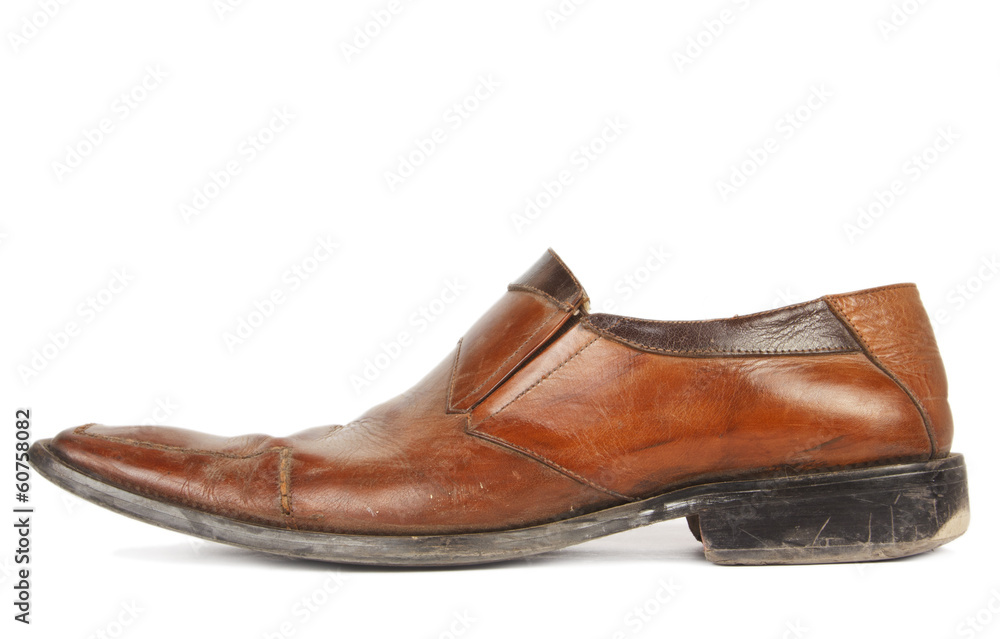 Used brown shoes isolated