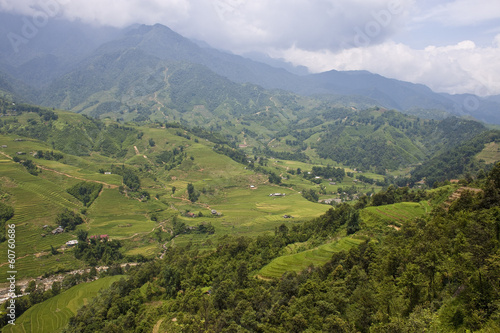 Paddy fields and village houses in a valley in northern Vietnam