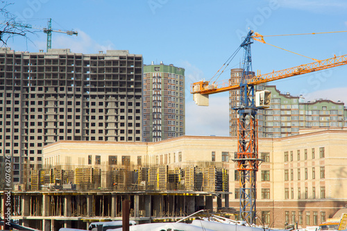 Construction site with crane, building