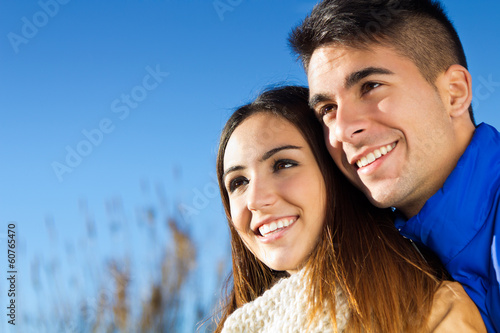 Happy young couple in the park