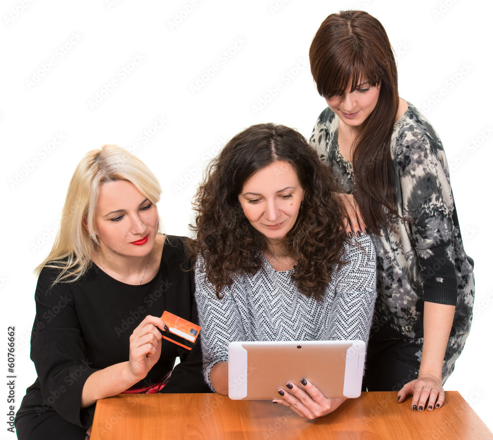 Three smiling women with tablet pc Three smiling women with tablet pc