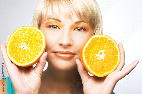 Woman with oranges
