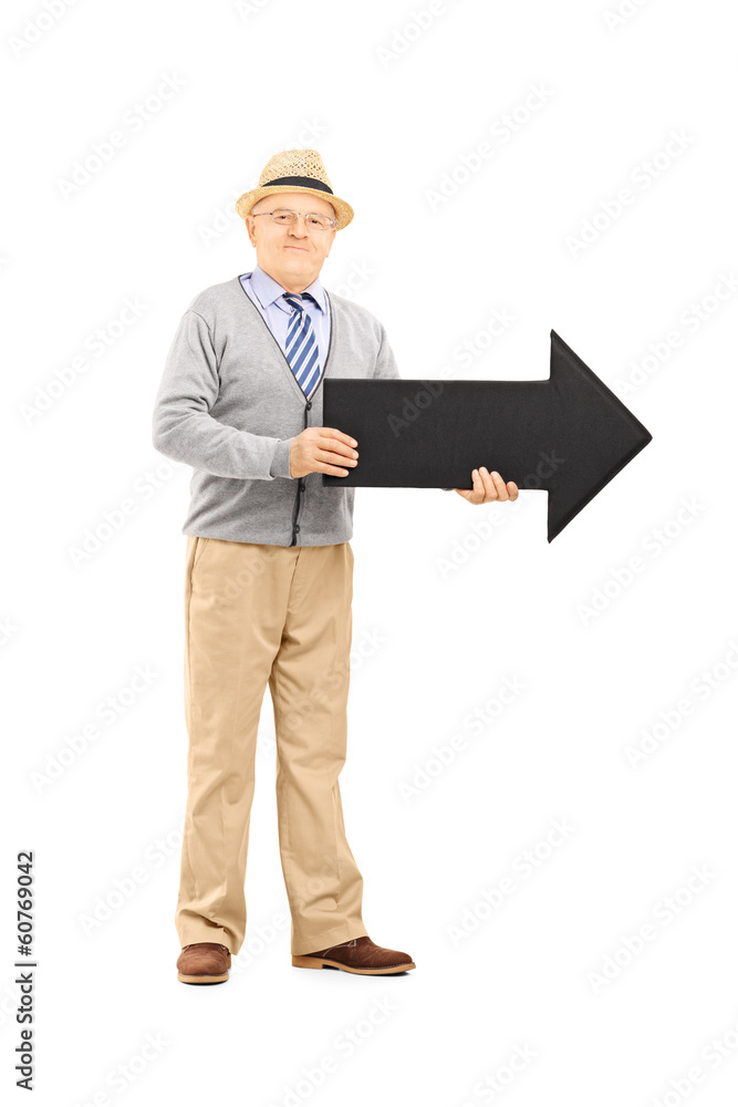 Full length portrait of senior gentleman holding arrow Full length portrait of senior gentleman holding arrow