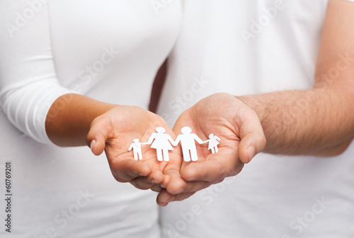 couple hands with paper man family