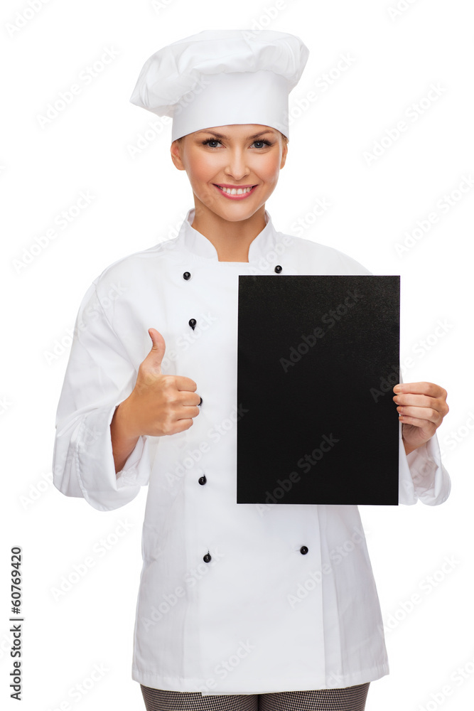 smiling female chef with black blank paper smiling female chef with black blank paper
