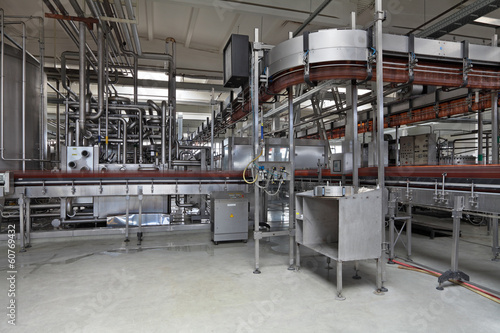 The interior of brewery  conveyor line for the bottling of beer