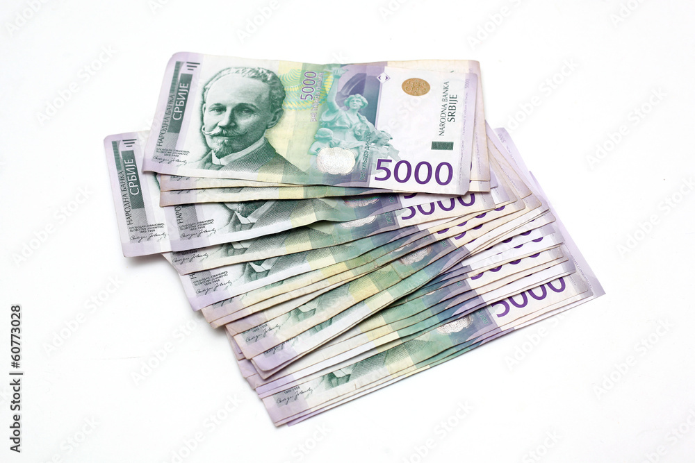 Serbian Currency - A Heap of 5000 Dinar Banknotes Serbian Currency - A Heap of 5000 Dinar Banknotes