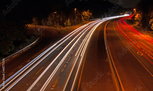 Headlight and Taillight Trails on a Busy Highway at Night