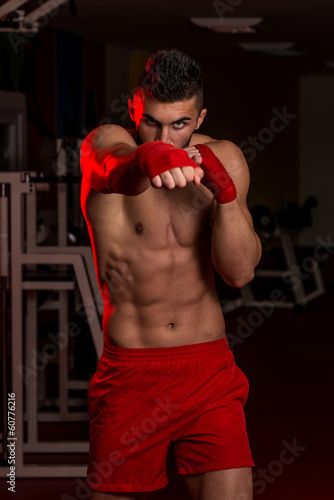 Muscular Boxer MMA Fighter Practice His Skills