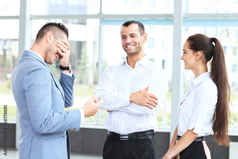 Business people meeting in office to discuss project Business people meeting in office to discuss project