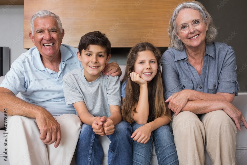 Portrait of grandparents and two kids in living room Portrait of grandparents and two kids in living room